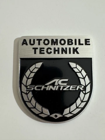 Емблема металева AC SCHNITZER (6.3х5.5 см) чорно-срібляста на скотчі