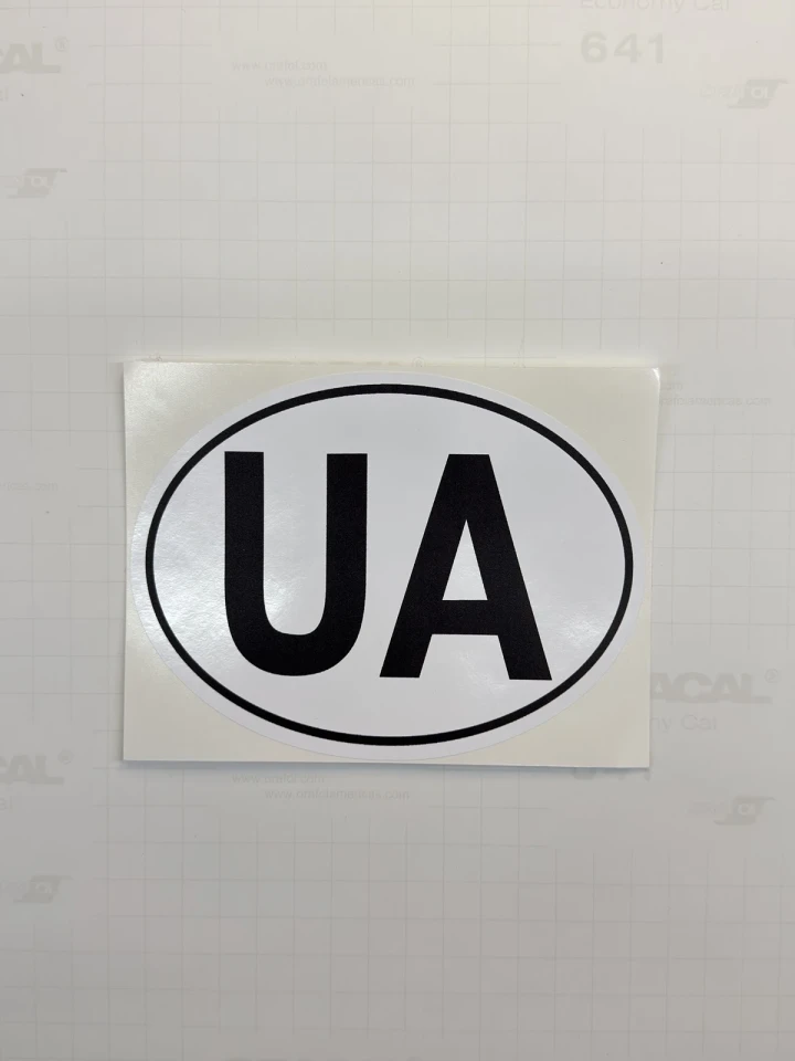Наклейка вінілова розпізнавальний знак України «UA» біла (14х10.6 см)